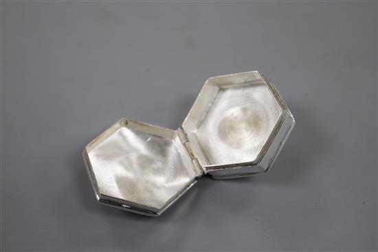 Three assorted modern silver pill boxes, including engraved hexagonal and rectangular with scroll border, largest 31mm.